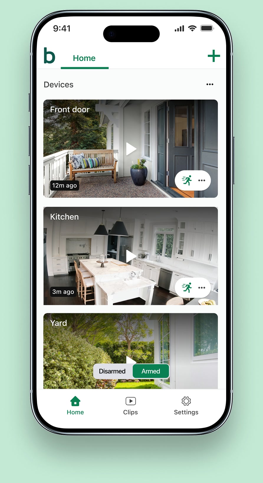 The Blink app home screen, showing live views from a front door, kitchen and yard camera